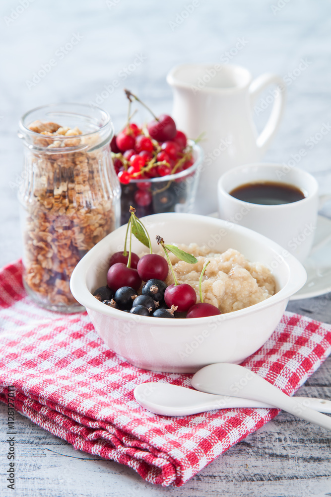 porridge with berries on a table, selective focus porridge with berries on a table, selective focus