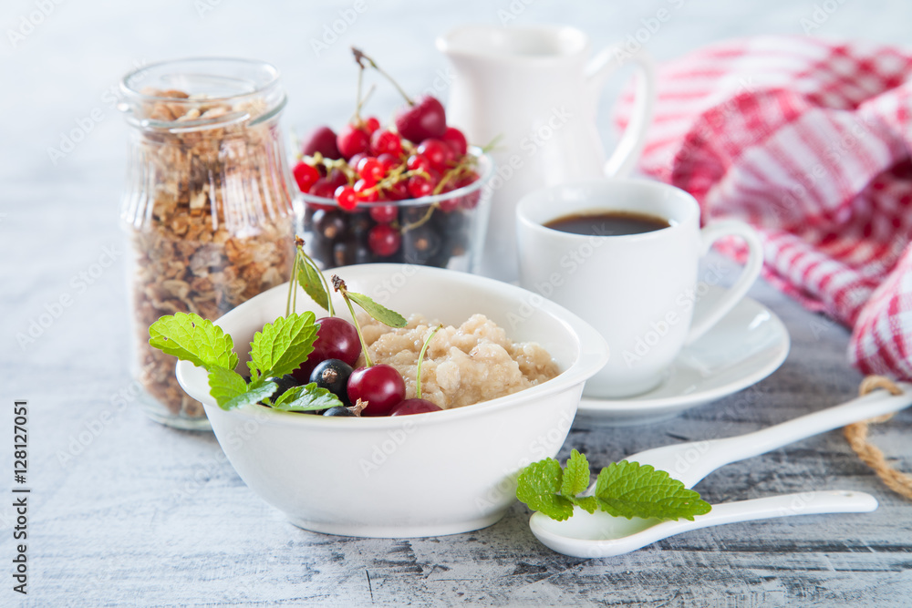 porridge with berries on a table, selective focus porridge with berries on a table, selective focus