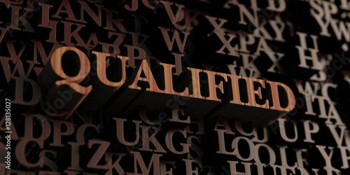 Qualified - Wooden 3D rendered letters/message. Can be used for an online banner ad or a print postcard.
