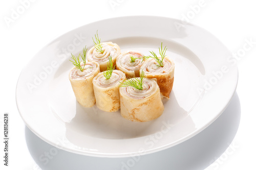 Pancakes with meat - a hearty lunch and dinne isolated on white