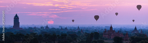 Panorama Hot air ballons over pagodas in sunrise at Myanmar
