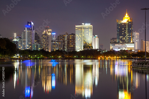Light in the city  beautiful view  flowers foreground and reflection  Bangkok  Thailand