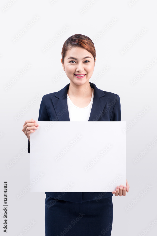 Young attractive asian woman showing a white board Young attractive asian woman showing a white board