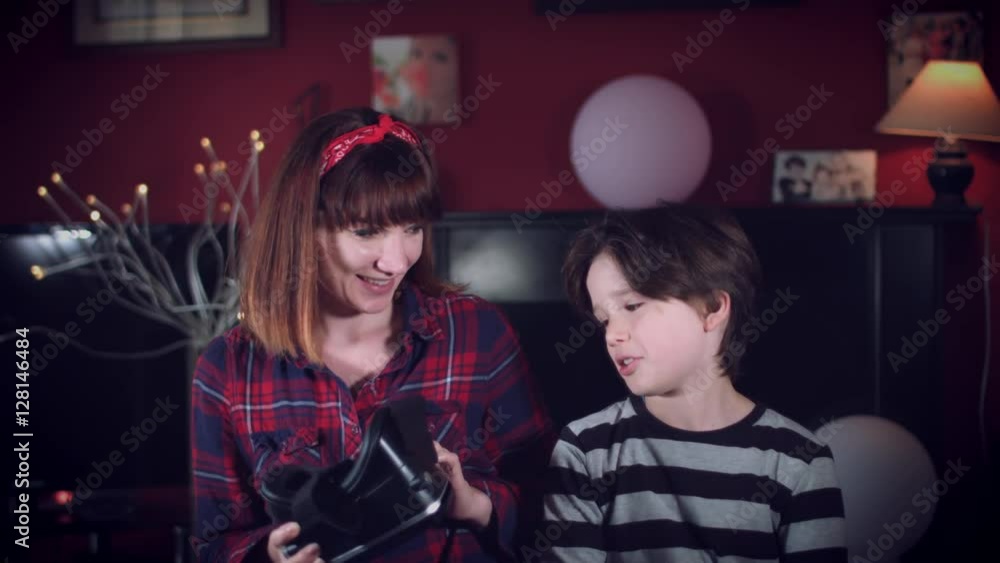 4k Family Home Shot of Woman showing Virtual reality Headset to her Son 4k Family Home Shot of Woman showing Virtual reality Headset to her Son