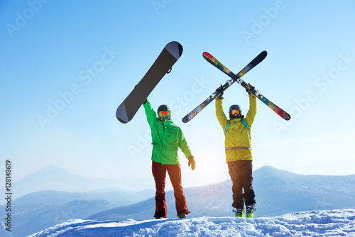 Skier and snowboarder mountain top
