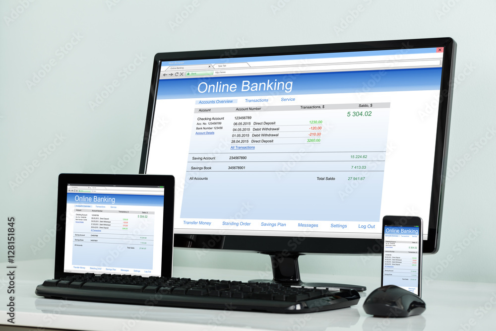 Electronic Gadget Showing Online Banking On Desk Electronic Gadget Showing Online Banking On Desk