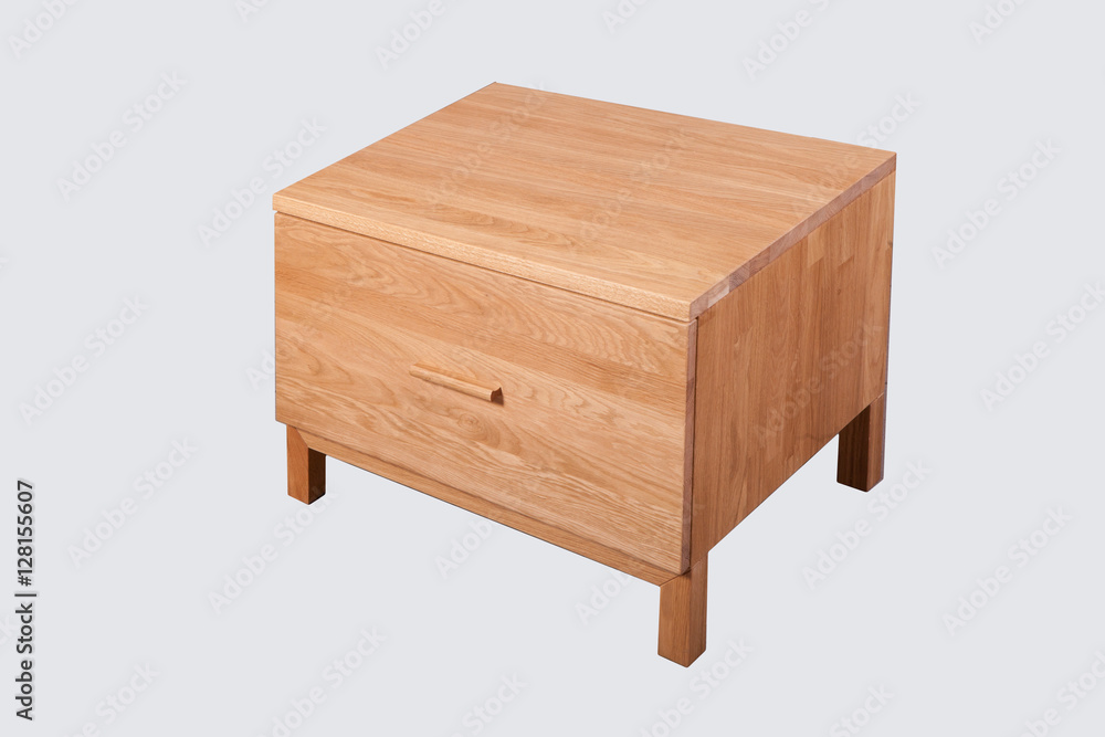 Nightstand oak on a light background in studio Nightstand oak on a light background in studio