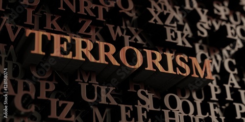 Terrorism - Wooden 3D rendered letters/message. Can be used for an online banner ad or a print postcard.