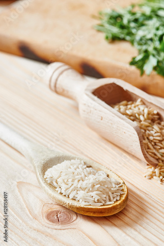 Basmati rice and brown rice on spoon