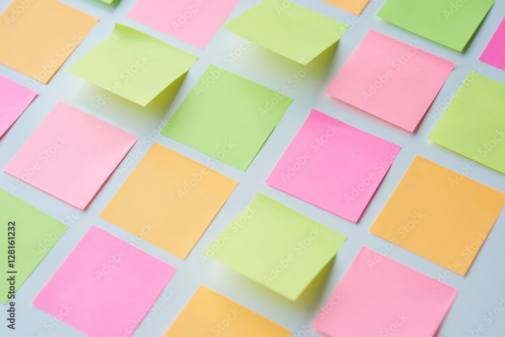 Empty sticky notes put on the table .
