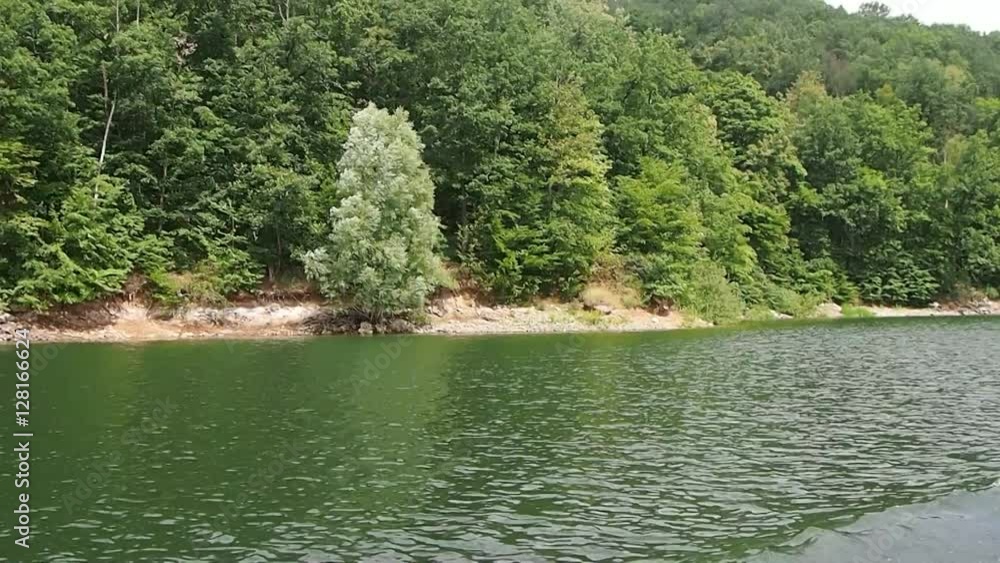View of surrounding nature from moving ship. View of surrounding nature from moving ship.