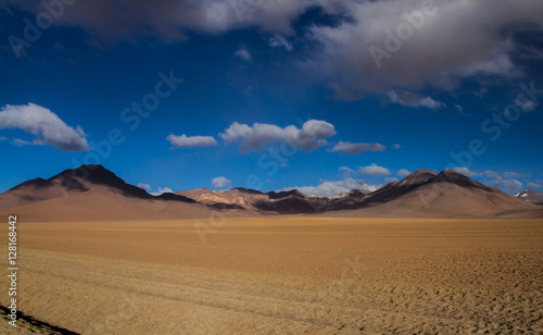 Desert and mountain over blue sky and white clouds on Altiplano,Bolivia Chile