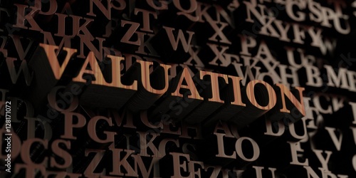 Valuation - Wooden 3D rendered letters/message. Can be used for an online banner ad or a print postcard.
