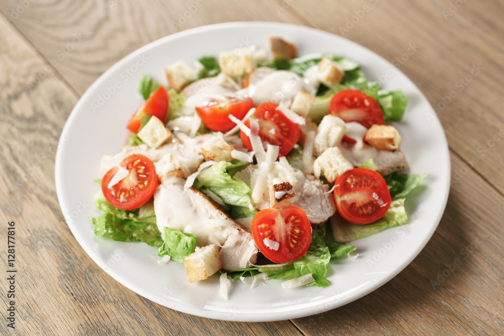 caesar salad with red cherry tomatoes, shallow focus caesar salad with red cherry tomatoes, shallow focus