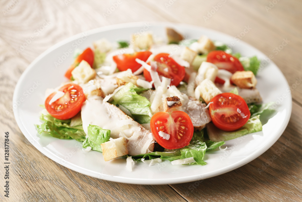 caesar salad with red cherry tomatoes, shallow focus caesar salad with red cherry tomatoes, shallow focus