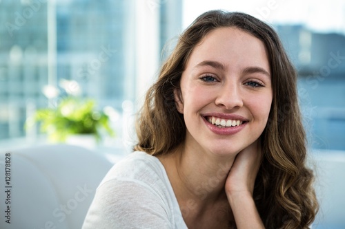 Free Download Happy woman smiling at the camera - GFXLoad