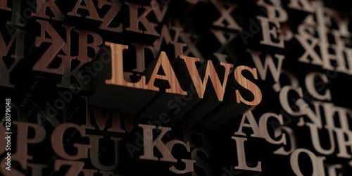 Laws - Wooden 3D rendered letters/message. Can be used for an online banner ad or a print postcard.
