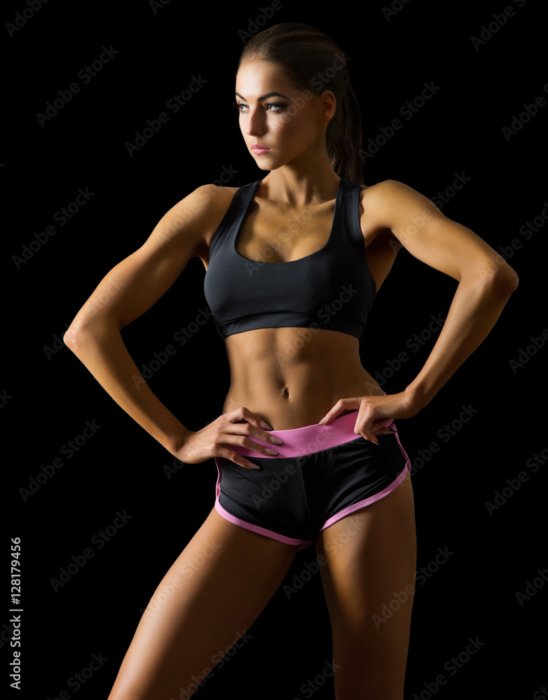 Fototapeta premium Young fitness girl isolated