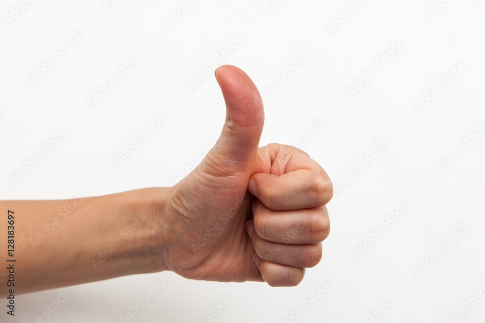 female hand with thumb finger up on white backgrounds female hand with thumb finger up on white backgrounds