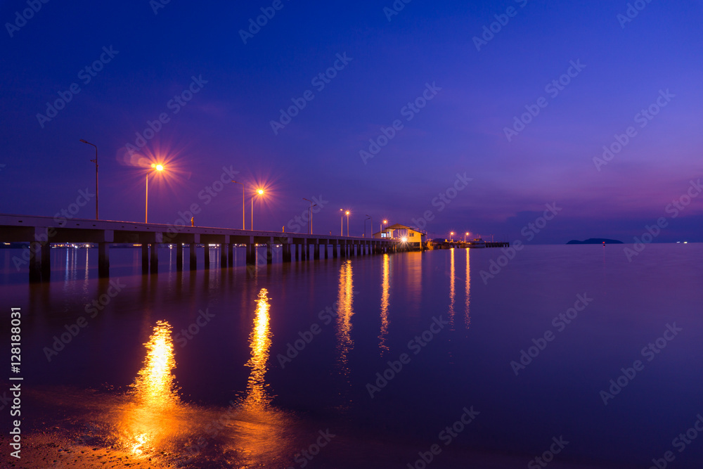 twilight landscape of pier on the sea.at sattahip beach,Chonburi,Thailand.