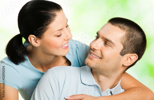 happy smiling amorous couple, outdoors