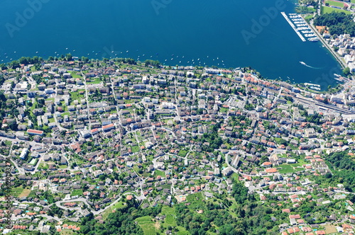 Luftaufnahme von Locarno beim Gleitschirmflug über die Tessiner Stadt am Lago Maggiore photo