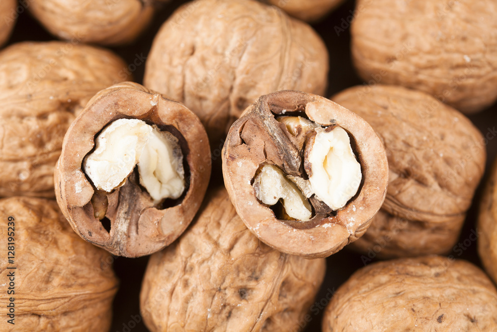 walnuts superfood on a wooden background walnuts superfood on a wooden background