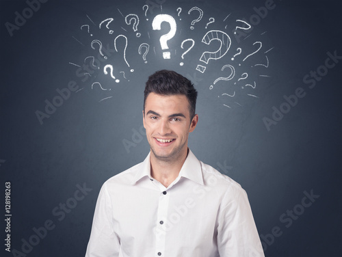 Businessman with question marks