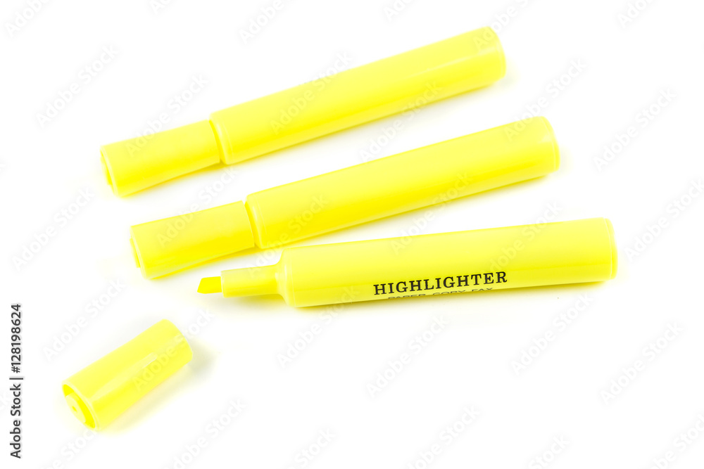 Three yellow highlighters isolated on white background Three yellow highlighters isolated on white background