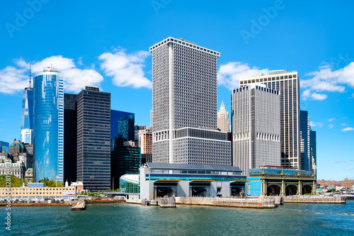 The lower Manhattan skyline and the South Ferry Terminal of the Staten Island Ferry seen from the New York bay