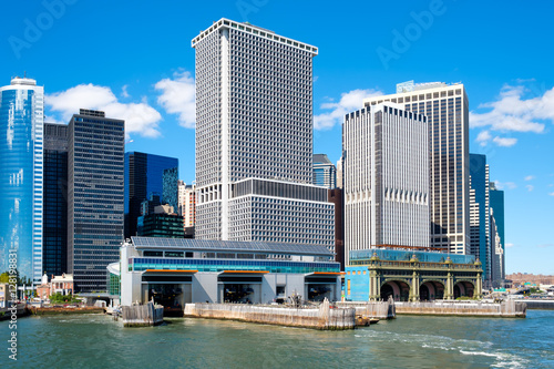 The lower Manhattan skyline and the South Ferry Terminal of the Staten Island Ferry seen from the New York bay