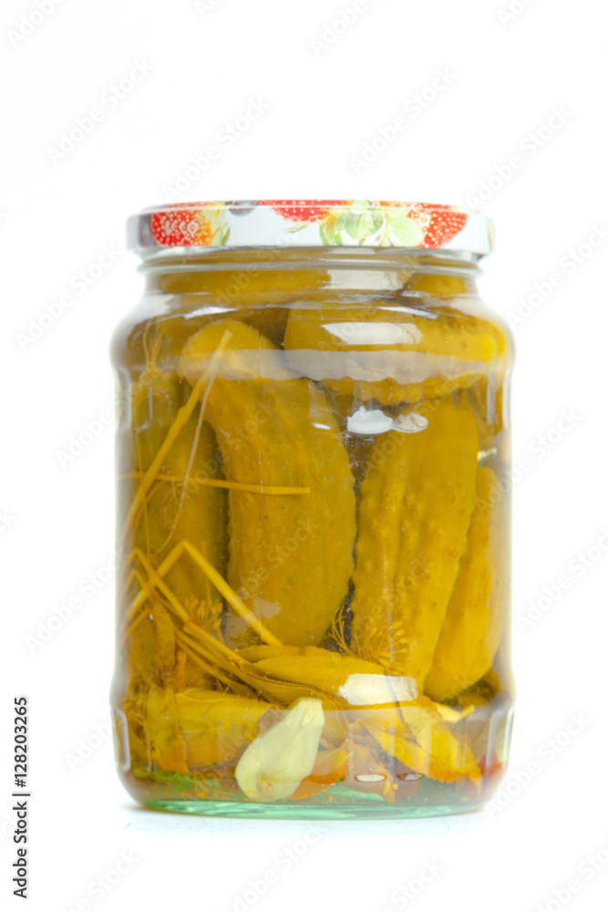 Canned vegetables in glass jars isolated on white background Canned vegetables in glass jars isolated on white background