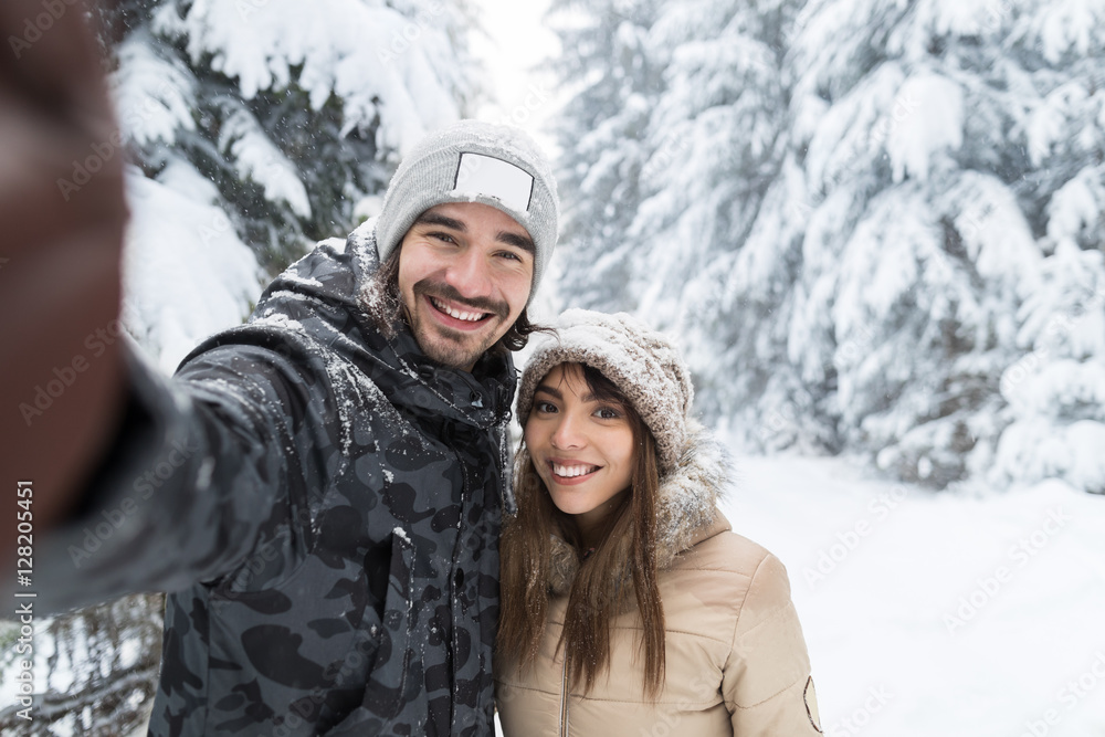 Man Taking Selfie Photo Young Romantic Couple Smile Snow Forest Outdoor Winter Pine Woods Man Taking Selfie Photo Young Romantic Couple Smile Snow Forest Outdoor Winter Pine Woods