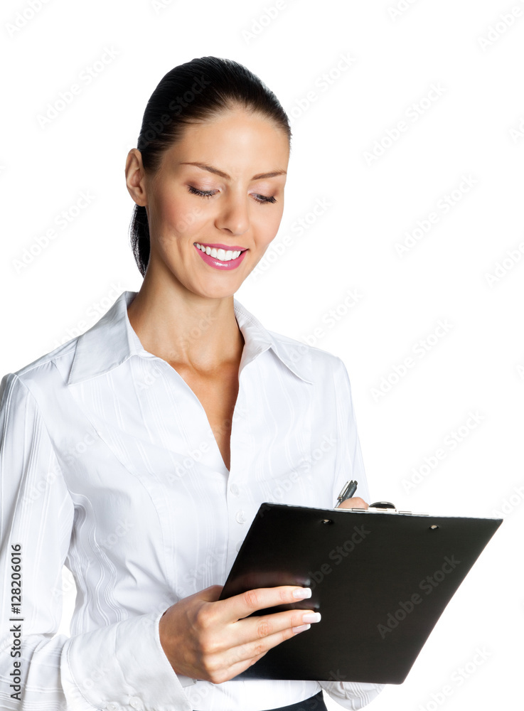young businesswoman with clipboard writing, isolated young businesswoman with clipboard writing, isolated
