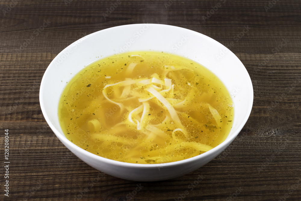 Chicken broth with noodles. Traditional polish soup. Chicken broth with noodles. Traditional polish soup.
