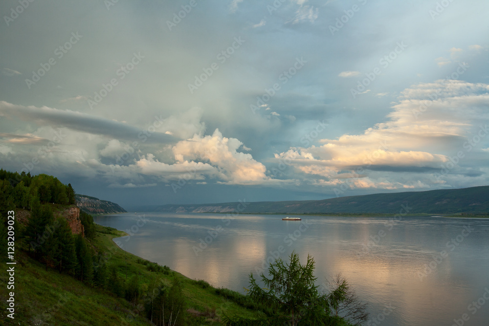 Beautiful clouds over a large river. Lena river. Yakutia. Russia.