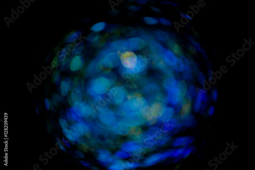 Abstract circular bokeh background blue lights.
