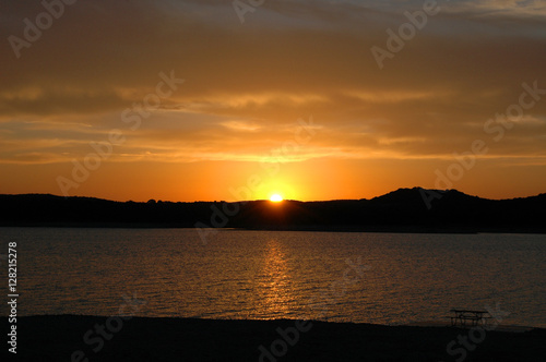 Glowing Lakeside Sunset Sunrise with Mountains in West Texas