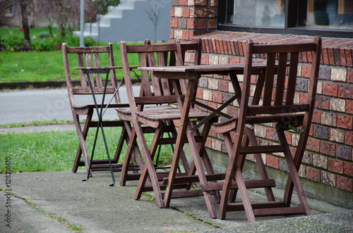Tables and chairs outside a cafe © Julia