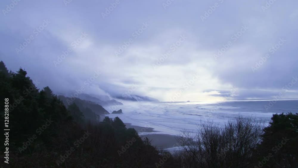 Stormy weather brings rain and fog to the Pacific Northwest shore in Oregon. Stormy weather brings rain and fog to the Pacific Northwest shore in Oregon.