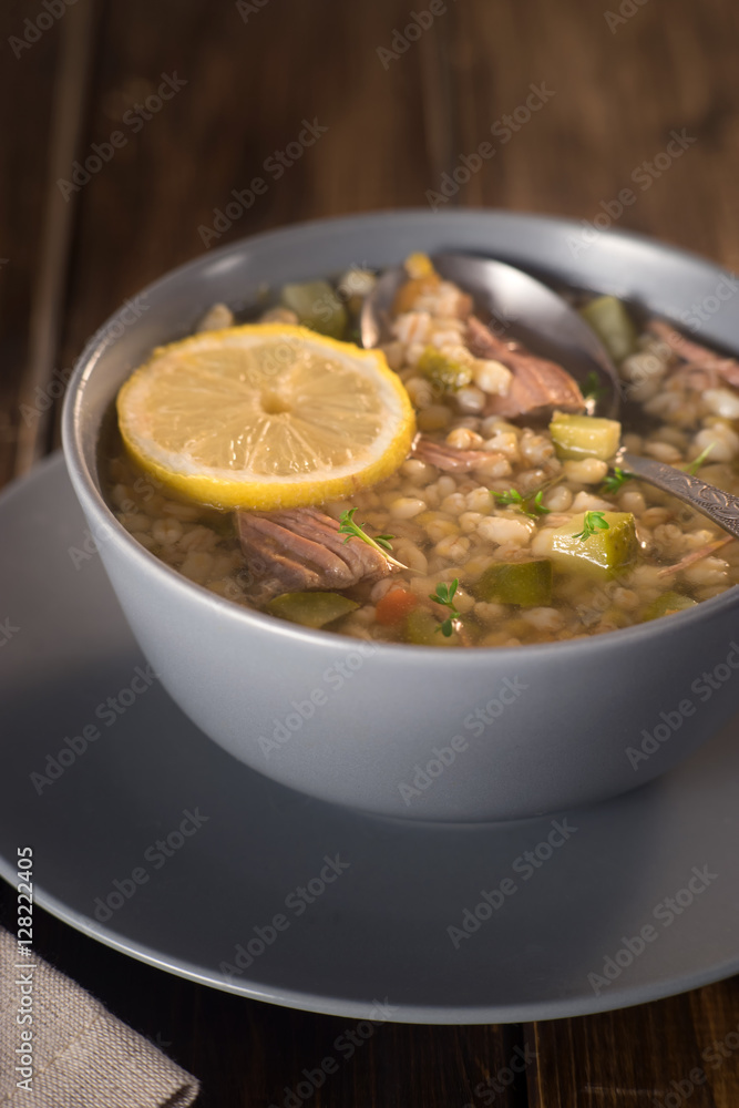 Meat soup with lemon, wine and bread Meat soup with lemon, wine and bread