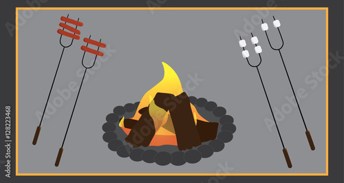 Camping image of campfire with hot dog and marshmallow stick or skewers
