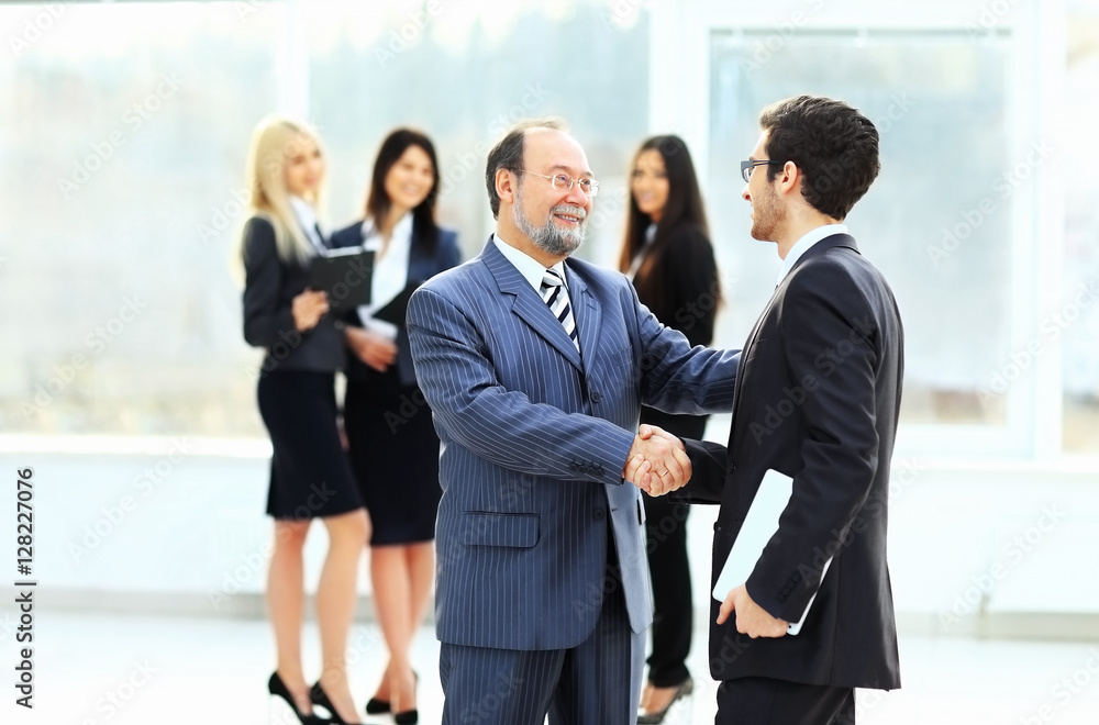 the meeting of two business partners at the presentation the meeting of two business partners at the presentation