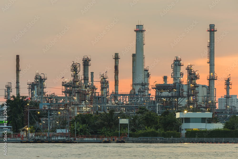 Petroleum factory with sunrise sky background