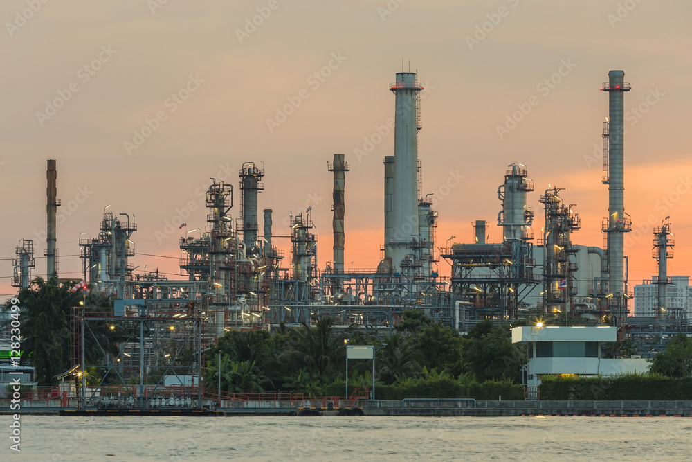 Petroleum factory with sunrise sky background Petroleum factory with sunrise sky background