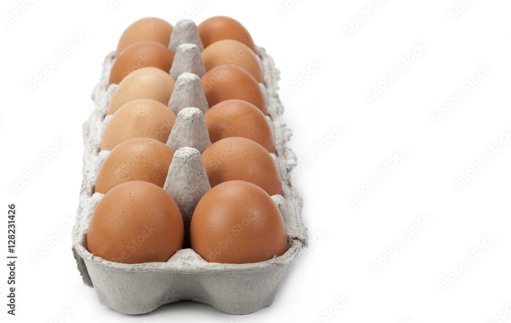 Dozen eggs isolated on a white background