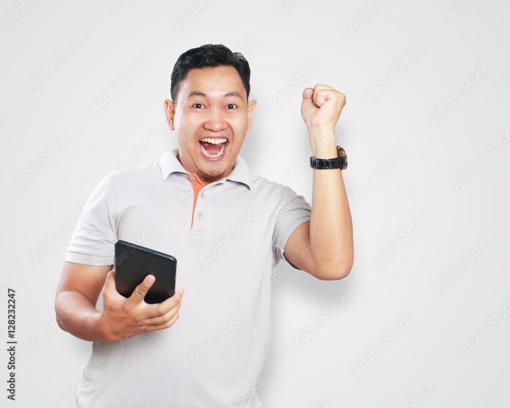 Funny Young Asian Guy Celebrating Victory Funny Young Asian Guy Celebrating Victory