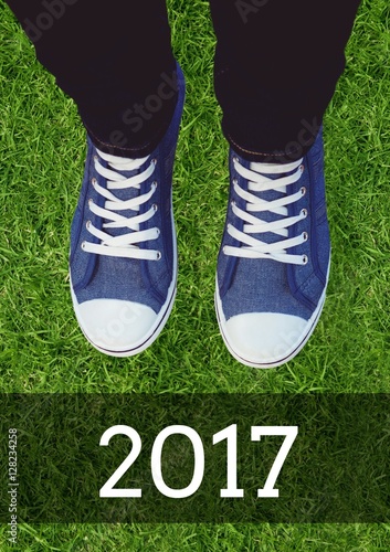 2017 new year wishes with teenager wearing sneakers © vectorfusionart