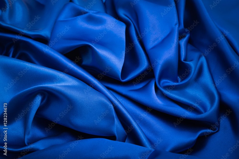 Grooved blue fabric background Grooved blue fabric background
