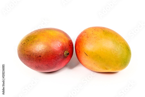 Two ripe mangos isolated on white background
